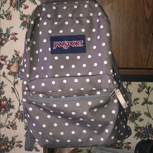 Janaport poka dot bookbag